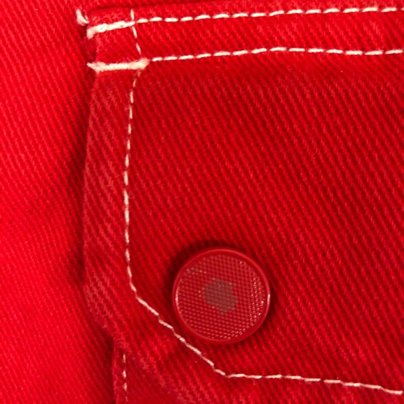 short red skirt with apparent white stitching. - Picture 3 of 4